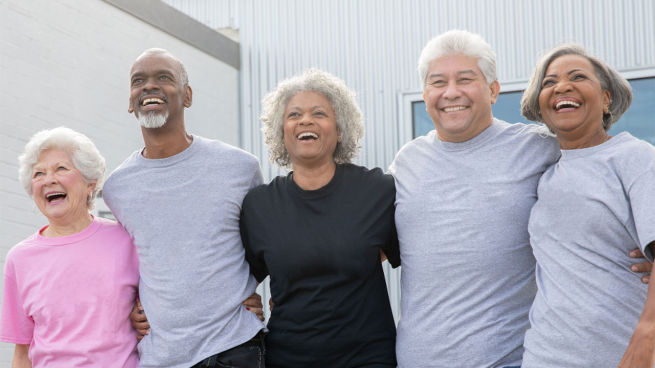 Group of seniors smiling for a photo